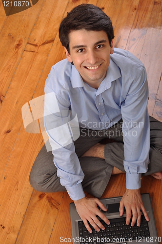 Image of Man surfing the web