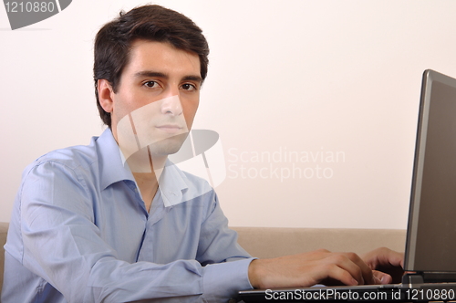 Image of Man surfing the web