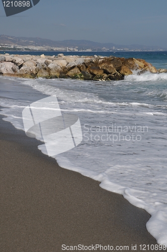 Image of Puerto Banus beach and stone pier