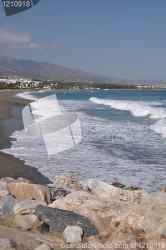 Image of Puerto Banus beach from stone pier