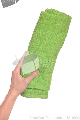 Image of Hand holding beach towel