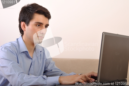 Image of Man surfing the web