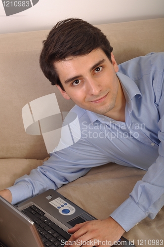 Image of Man surfing the web