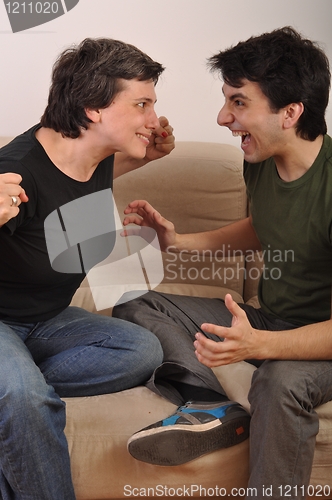 Image of Woman and man yelling face to face