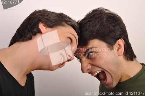 Image of Woman and man yelling face to face