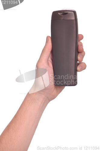 Image of Hand holding sun lotion