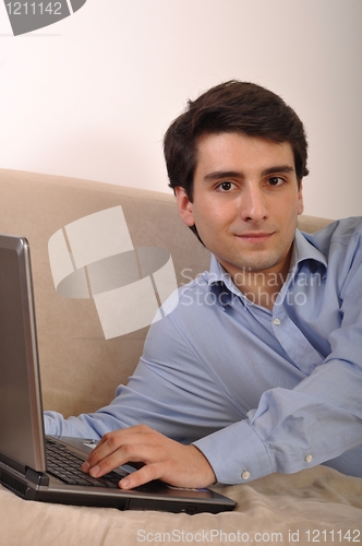 Image of Man surfing the web
