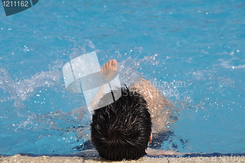 Image of Man in water gymnastics