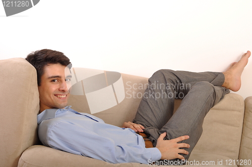 Image of Man relaxing on the couch
