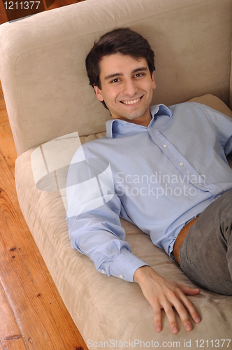 Image of Man relaxing on the couch