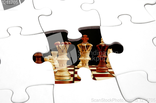 Image of puzzle and chess