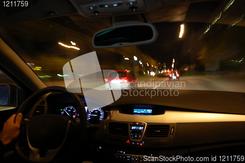 Image of night drive with car in motion 