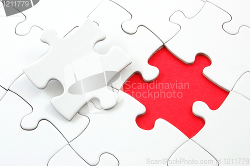 Image of blank puzzle with missing piece