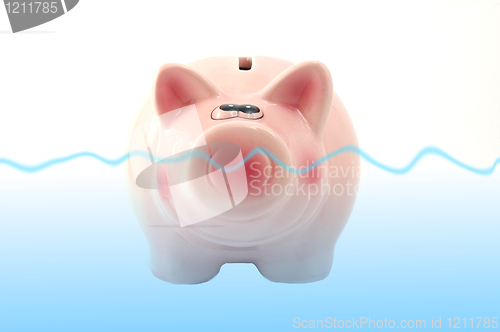 Image of piggy bank swimming in water