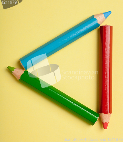 Image of Color pencils forming a triangle frame