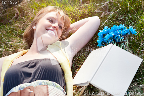 Image of Beautiful Caucasian woman relaxing outdoor