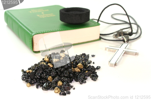 Image of frankincense with incense censer and the Law