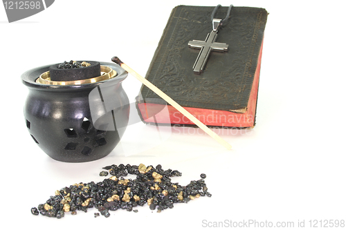 Image of frankincense with incense censer and Bible