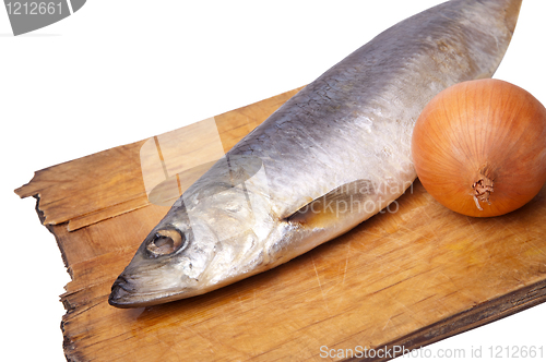 Image of Herring with onion on old kitchen board