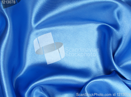 Image of Smooth elegant blue silk as background 