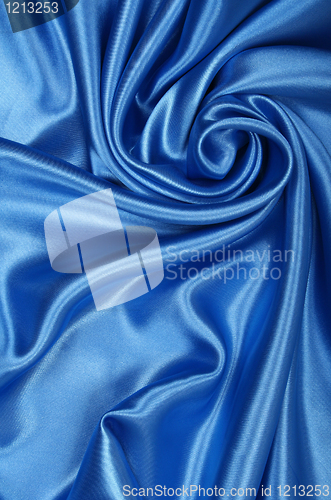 Image of Smooth elegant blue silk as background 