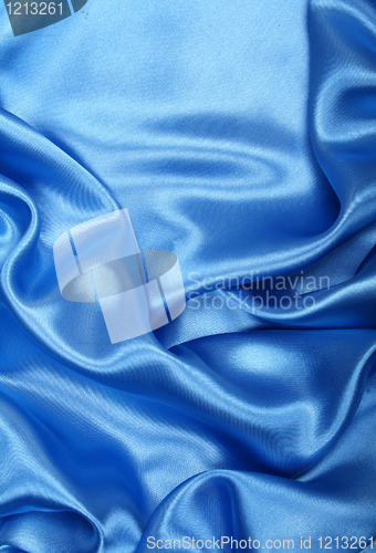 Image of Smooth elegant blue silk as background 