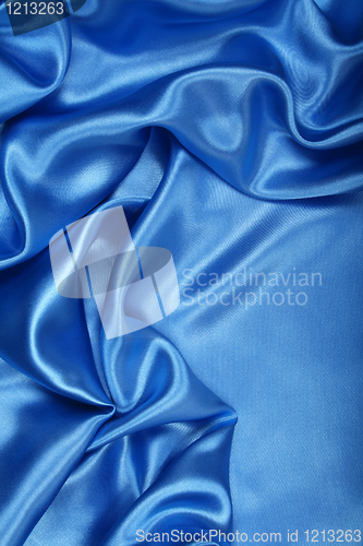 Image of Smooth elegant blue silk as background 