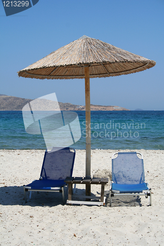 Image of Greece. Kos island. Two chairs and umbrella on the beach