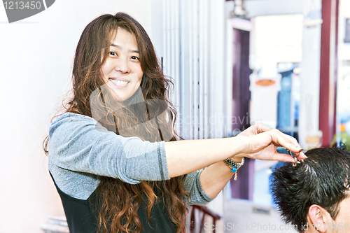 Image of Hair stylist working