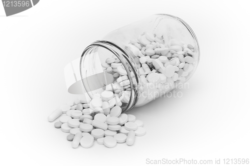 Image of pills in glass container