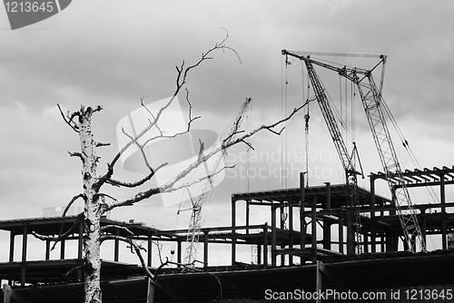 Image of construction yard with crane against the sky