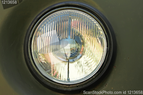 Image of Old car round headlight