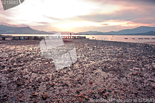 Image of Sea stones at sunset