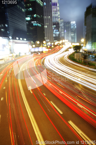 Image of Fast moving cars at night 