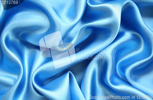 Image of Smooth elegant blue silk as background