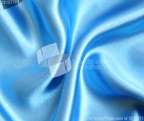 Image of Smooth elegant blue silk as background 