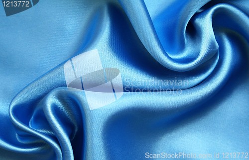 Image of Smooth elegant blue silk as background