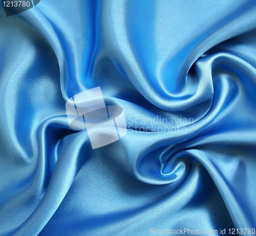 Image of Smooth elegant blue silk as background