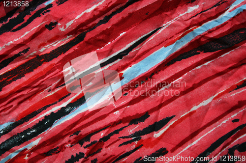 Image of Blue, black and red strips on the fabric as background