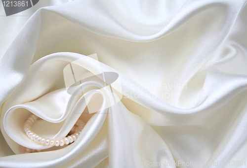 Image of Smooth elegant white silk with pearls as wedding background