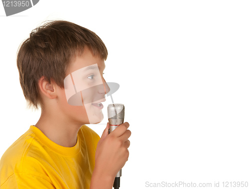 Image of boy speking with microphone