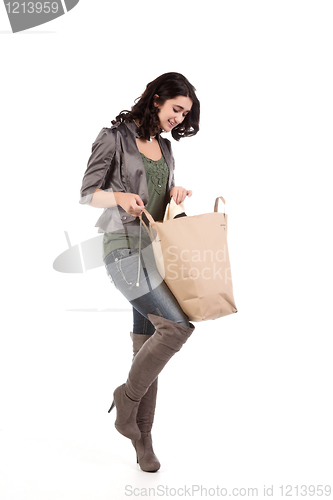 Image of young woman with shopping