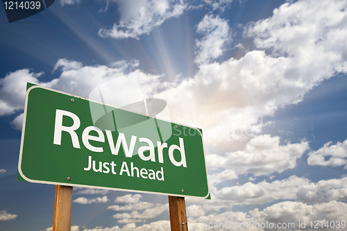 Image of Reward Green Road Sign Against Clouds