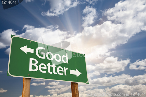 Image of Good, Better Green Road Sign Against Clouds