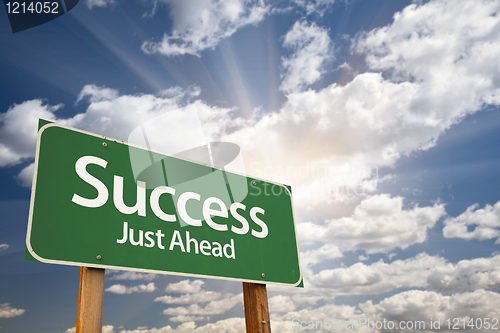 Image of Success Green Road Sign Against Clouds