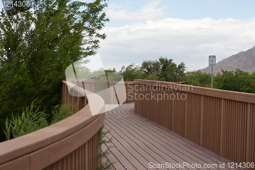 Image of Board Walk trough green bushes