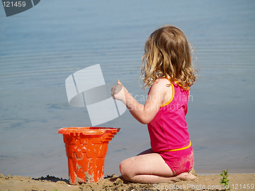 Image of girl playing at beach