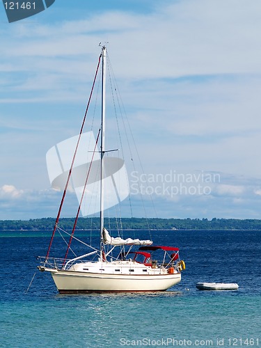 Image of sailboat anchored in harbor
