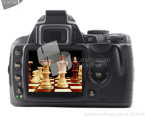 Image of digital camera and chess