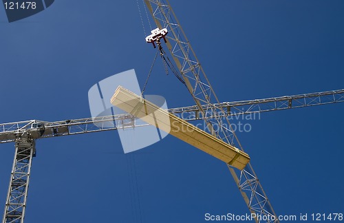 Image of Crane lifting timber